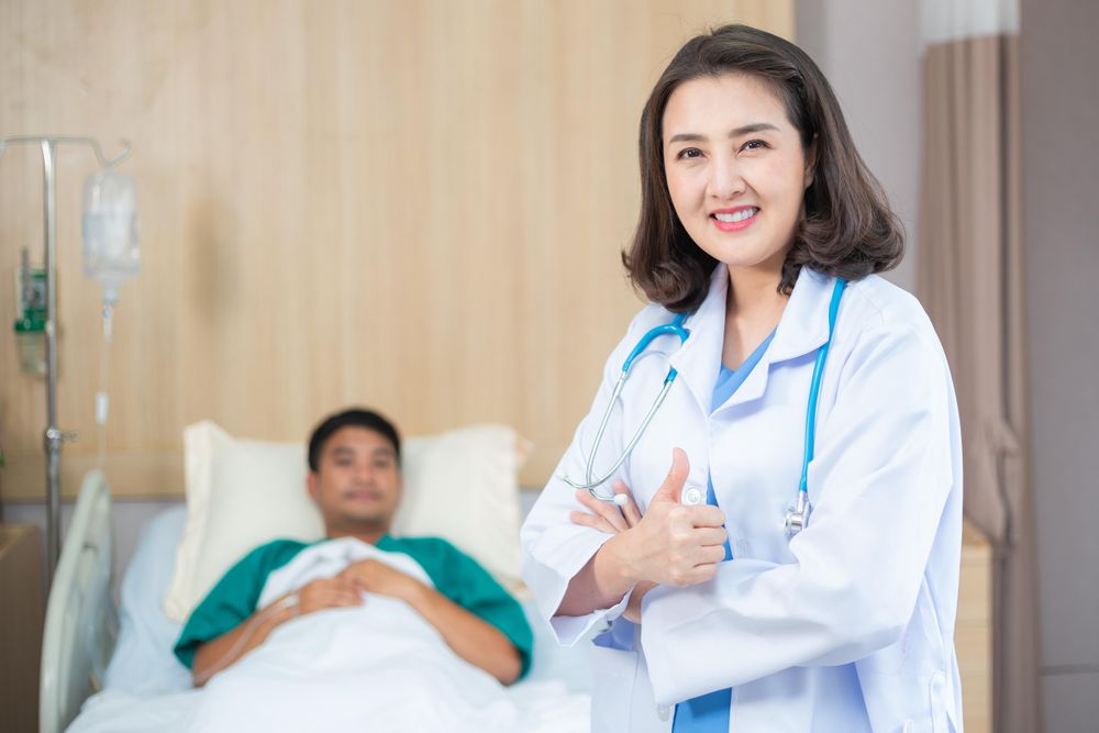 Doctor smiling after treating patient