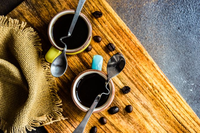 Top view of two cups of coffee with star garnish