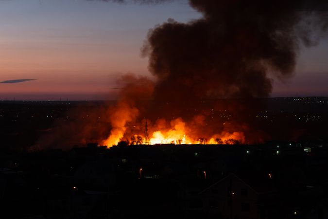 Massive fire erupts at residential area during nighttime hours