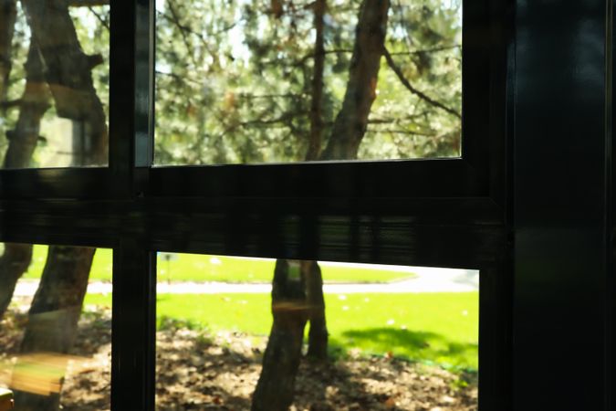 window frame in restaurant against park