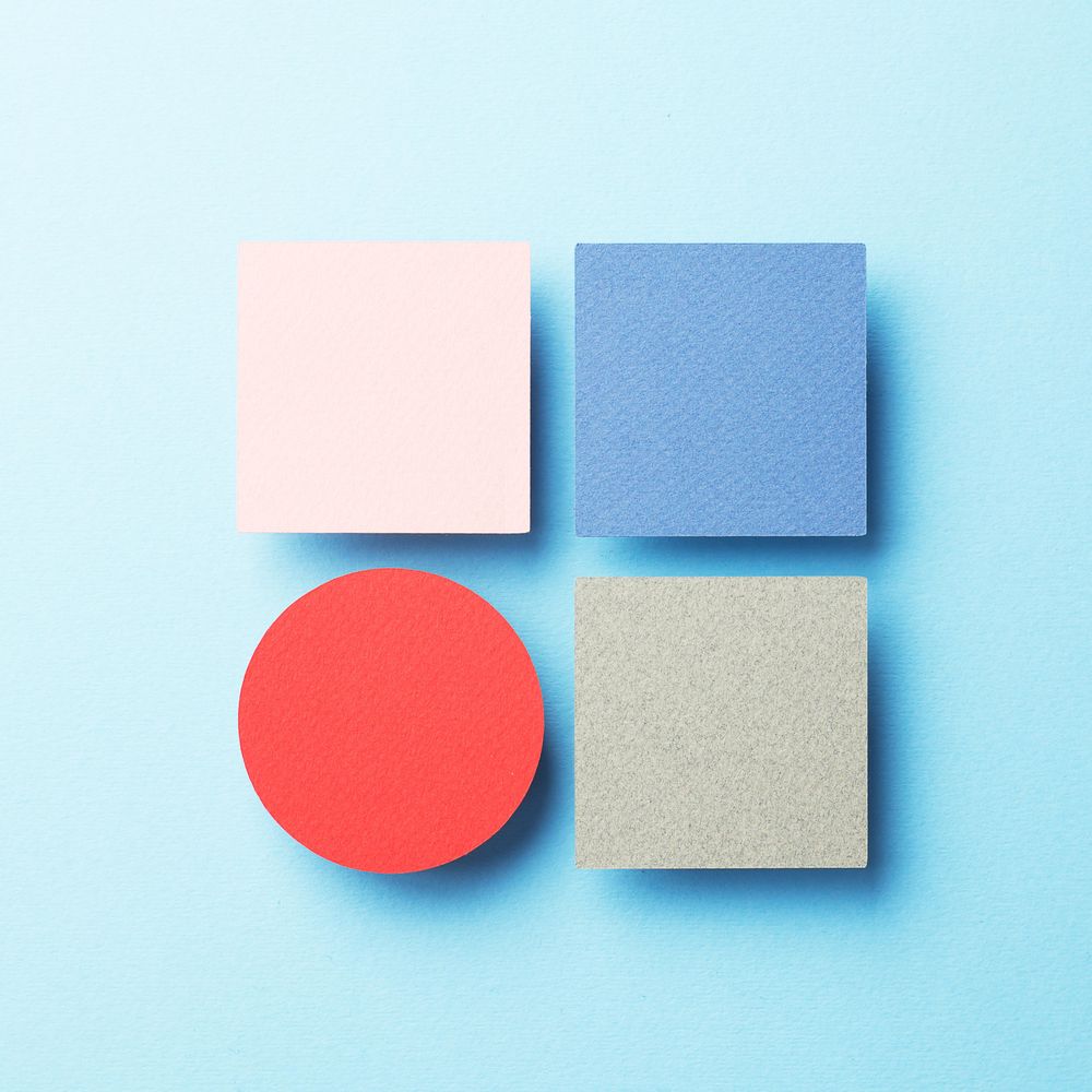 Three  paper squares and a paper circle