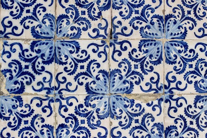 Beautiful shabby facade, wall decoration of old Lisbon building, Portugal, decorative background.