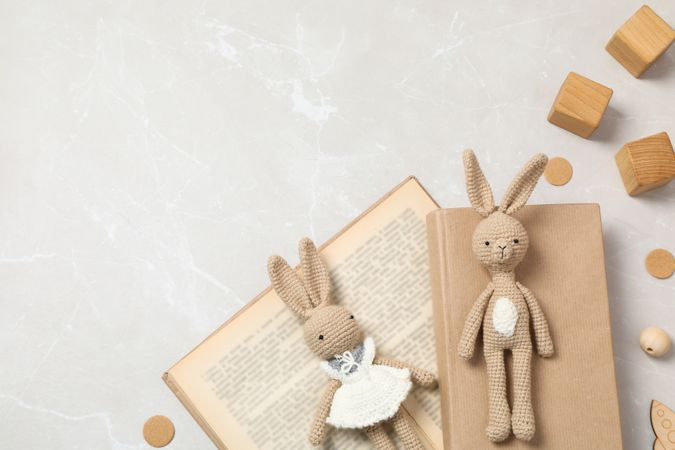 A children's book with toys on a light background.
