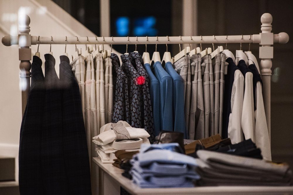 Clothing rack of me outwear in fashion store