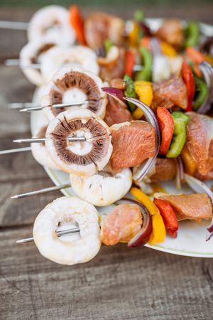 top view of plate with sticks of pork with vegetables