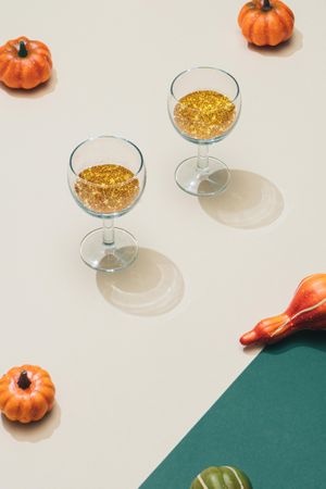 Table with seasonal squash and glitter cocktails