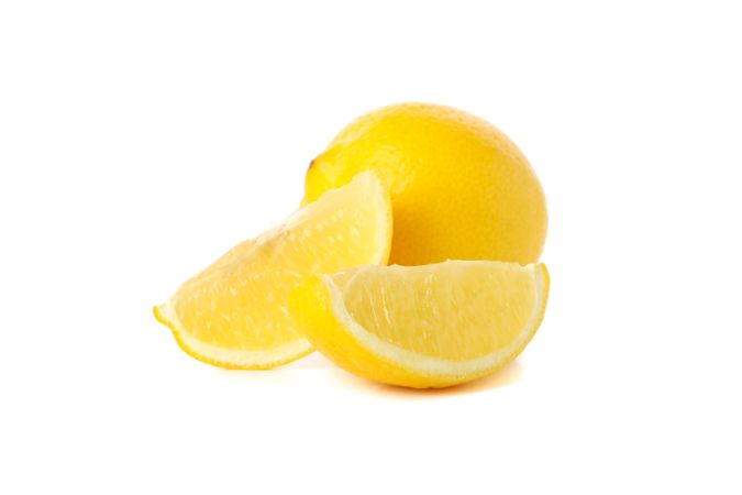 Fresh lemon isolated on light background. Ripe fruit