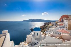 A perfect summer view of the Aegean Sea from a patio in Santorini 5pNGeb