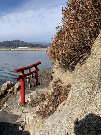 Red Torii on waterside