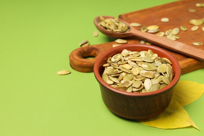 Concept of Autumn vibe food, Pumpkin, Pumpkin seeds, space for text