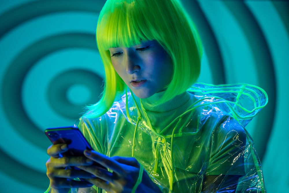 Asian young woman using phone