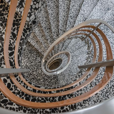 Top view of Brown and gray spiral stairs