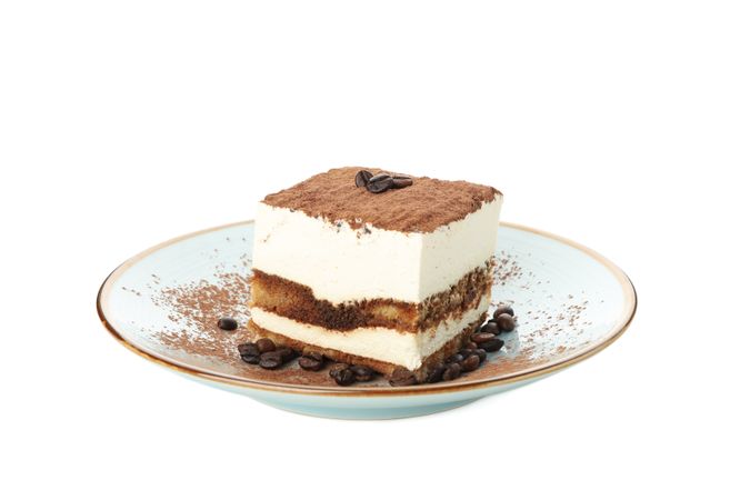 Sweet tiramisu isolated on blank background. Tasty dessert
