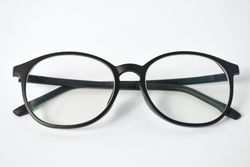 Spectacles on plain studio background
