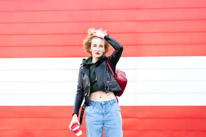 Curly female hipster outdoors