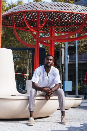 Stylish Black man in city street