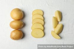 Potatoes cut in different ways in three lines 0gW8N0