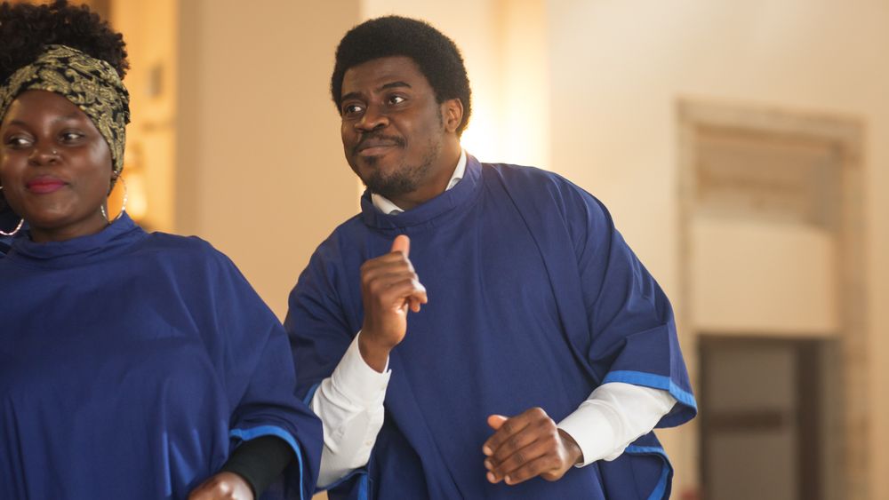 Black Christian Male Gospel Singer Singing, Happy to be Spreading the Love of Lord Jesus Christ.