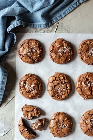 Homemade brownie cookies arranged on baking paper
