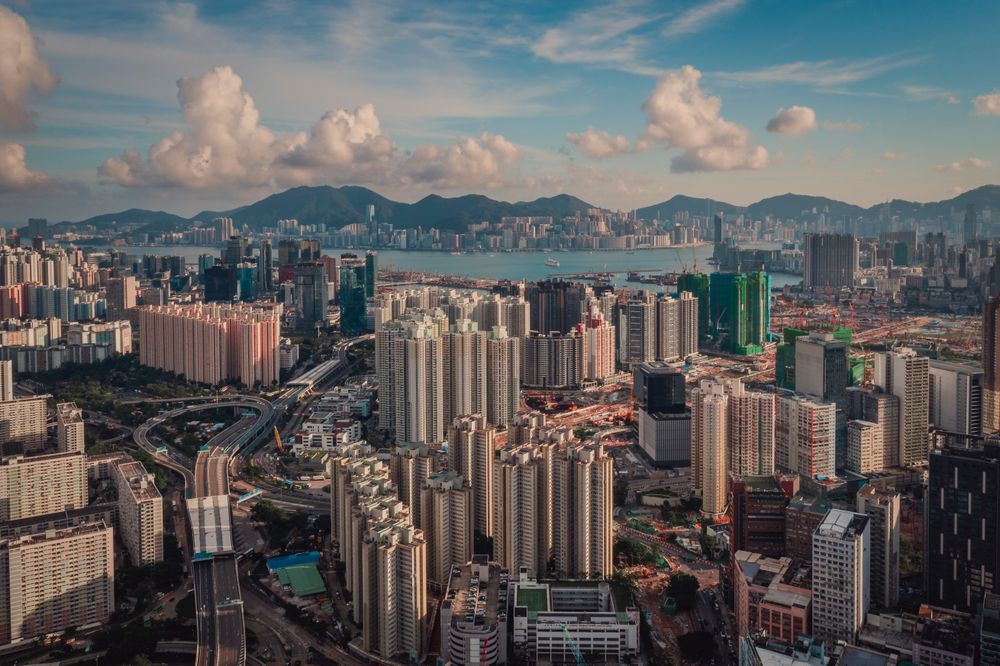 Aerial view of city at sunset