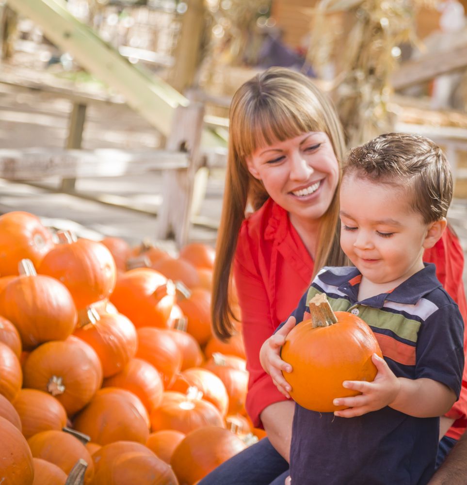 Happy Family at the Pumpkin Patch