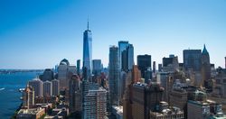 Scenic Aerial New York City View of Lower Manhattan Architecture. Panoramic Wall Street Financial District Photo from a Helicopter. Cityscape with Office Buildings and Skyscrapers