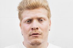 Close up portrait of a Latino man with albinism