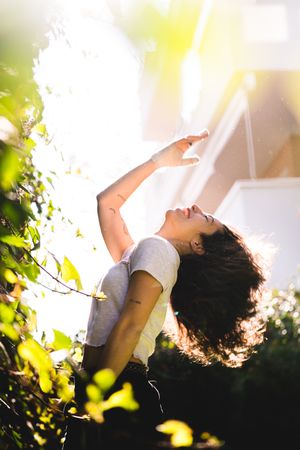 Cheerful woman in garden