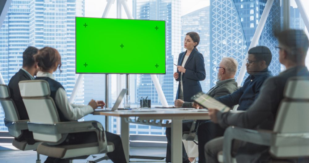 Office Conference Room Presentation: Beautiful Businesswoman Talks, Uses Green Screen Chroma Key TV Set