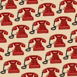 Rows of vintage red rotary phones.