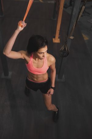 Athletic woman training in gym