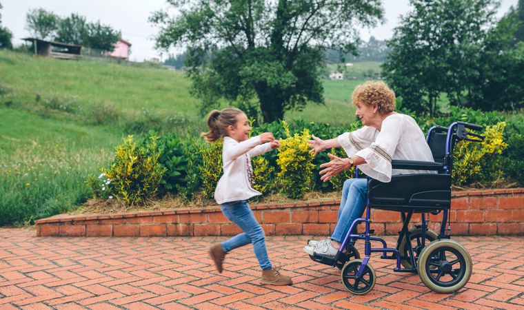Granddaughter running to greet her grandmother