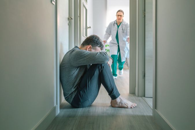 Female doctor running to help patient