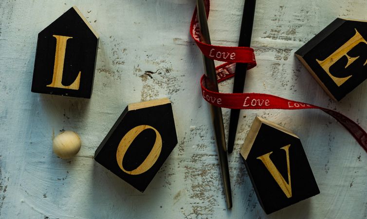 Love spelled in blocks on table