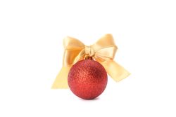 Christmas ball with bow isolated on plain background