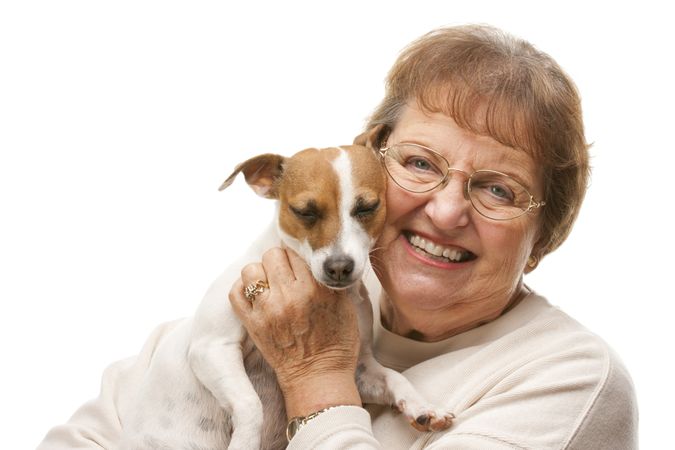 Happy Older Woman with Puppy.