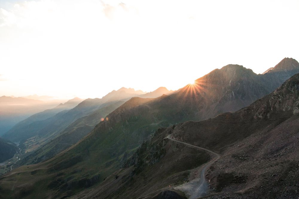 Mysterious mountain high in row in sunlight