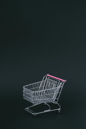 Shopping cart on dark background
