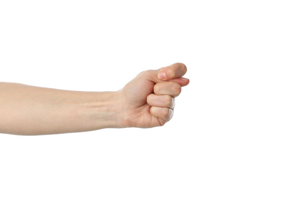 Female hand showing gesture, isolated on plain background