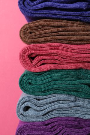 Casual clothes and wearing concept - socks, clothes for foot