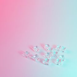 Ice cubes in vibrant bold gradient holographic colors