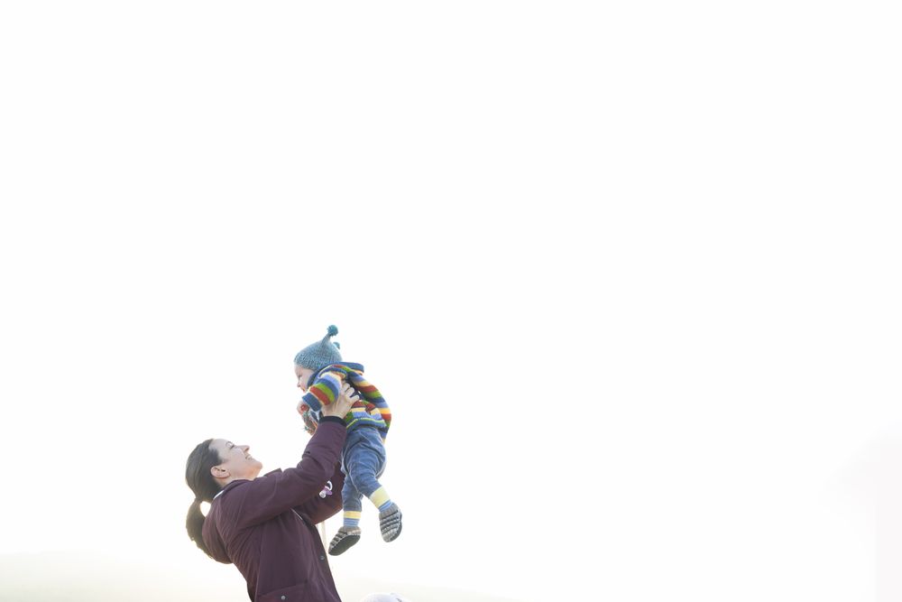 A mother and her child having fun together.