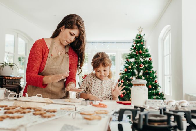 Mother and daughter cooking for Christmas