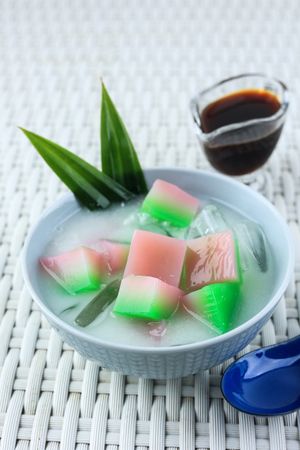 Es Selendang Mayang, Rice Flour Pudding served with Coconut Milk and Palm Sugar Syrup.