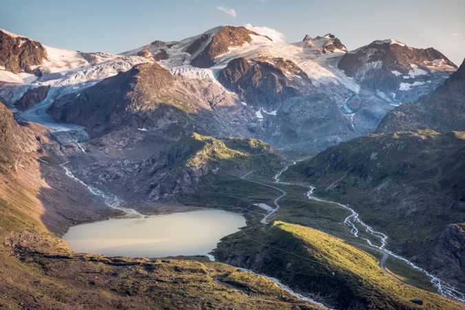 Calm lake surrounded by mountains