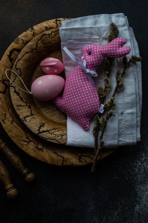 Easter table setting with top view of plate with rabbit and egg decorations