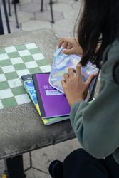 Close-up shot of girl opening her pencil case