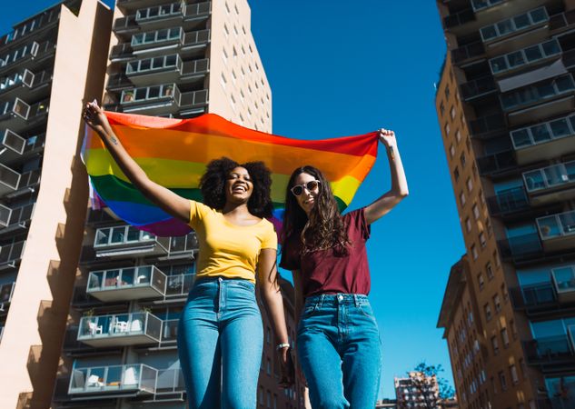 Female couple with rainbow flag