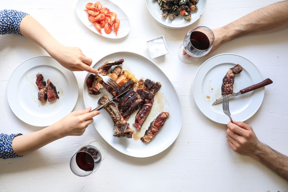 Couple having delicious dinner with wine