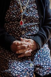 Detail of hands of an older woman